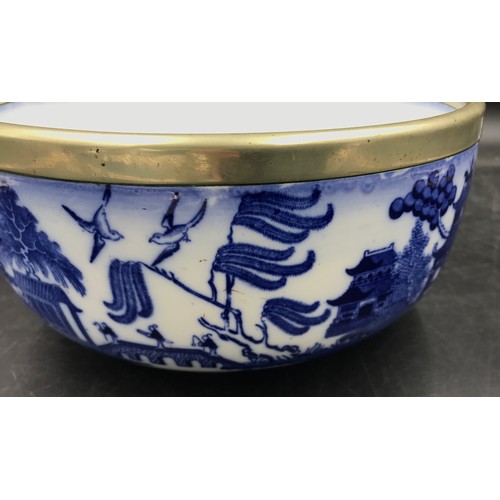 2 - A Mintons blue and white bowl decorated in the willow pattern with white metal collar around rim, 24... 