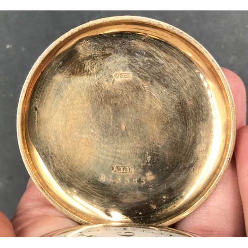 12 - A Zenith 9ct gold hunter pocket watch marked inside 2537842 Dennison watch case co ltd. 95.3gm.