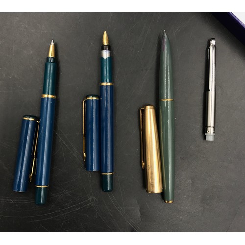 22 - Three Parker pens,  two fountain and one ball point, one fountain pen inscribed M. Needler in presen... 