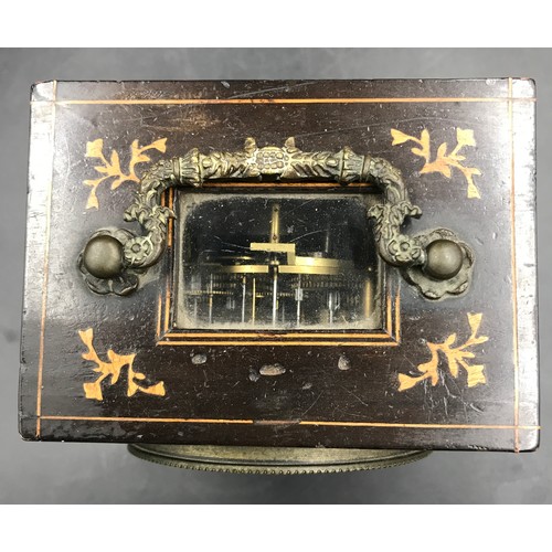 26 - A wooden cased mantle clock with 8 day movement marked Charles A Paris to face, back panel is marked... 