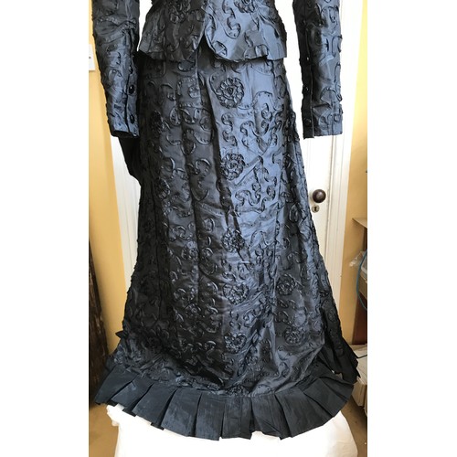 38 - A reproduction Victorian black lace skirt and jacket (label 