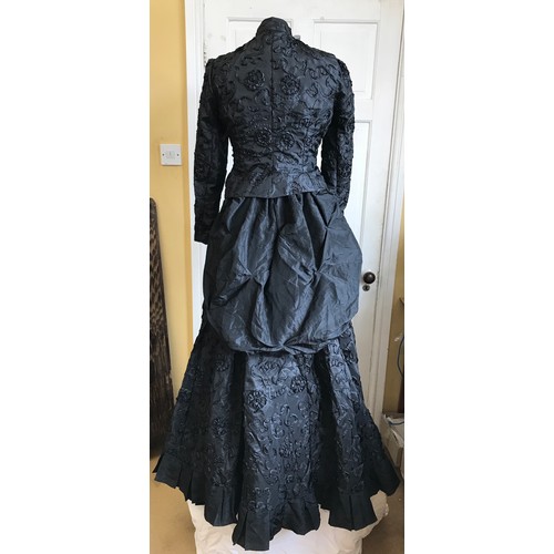 38 - A reproduction Victorian black lace skirt and jacket (label 