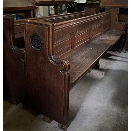 139 - A 19thC oak pew with floral roundel to one end by Sir George Gilbert Scott. 244 L x 96h x 52cm d.

P... 