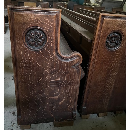 139 - A 19thC oak pew with floral roundel to one end by Sir George Gilbert Scott. 244 L x 96h x 52cm d.

P... 