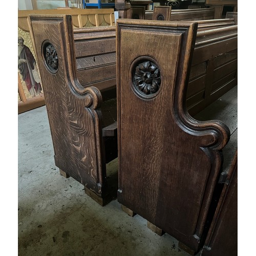 139 - A 19thC oak pew with floral roundel to one end by Sir George Gilbert Scott. 244 L x 96h x 52cm d.

P... 