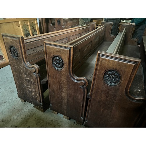 139 - A 19thC oak pew with floral roundel to one end by Sir George Gilbert Scott. 244 L x 96h x 52cm d.

P... 