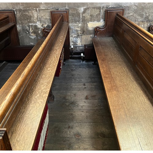 139 - A 19thC oak pew with floral roundel to one end by Sir George Gilbert Scott. 244 L x 96h x 52cm d.

P... 