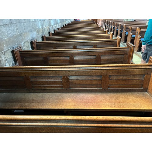 139 - A 19thC oak pew with floral roundel to one end by Sir George Gilbert Scott. 244 L x 96h x 52cm d.

P... 