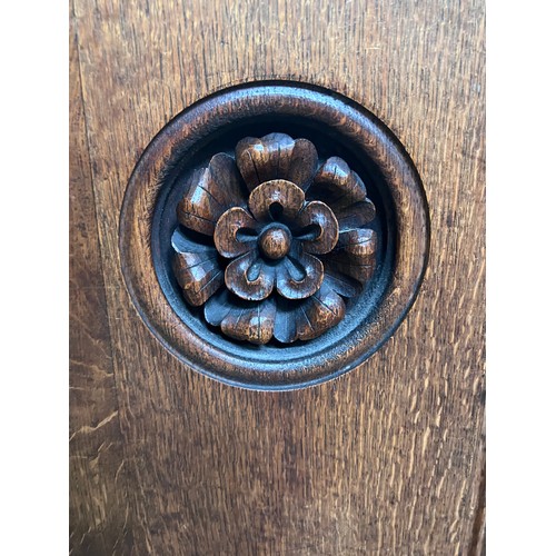 139 - A 19thC oak pew with floral roundel to one end by Sir George Gilbert Scott. 244 L x 96h x 52cm d.

P... 