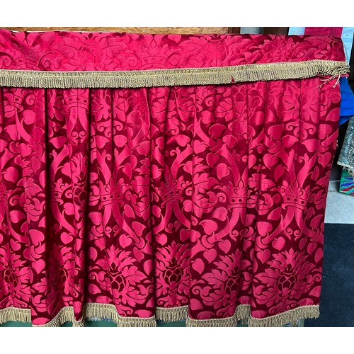 155 - A red altar frontal with gold fringing. 190 x 85cm.