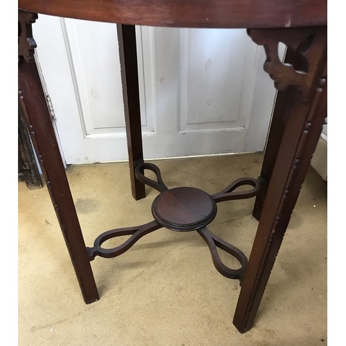 48 - A Edwardian circular mahogany occasional table with carved patterned edge 73h x 65cm d.