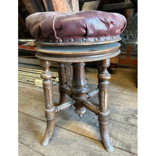 162 - A 19thC adjustable swivel topped stool with red leather top, maker H. Brooks and Co. Ltd. 7220/133, ... 