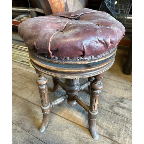 162 - A 19thC adjustable swivel topped stool with red leather top, maker H. Brooks and Co. Ltd. 7220/133, ... 