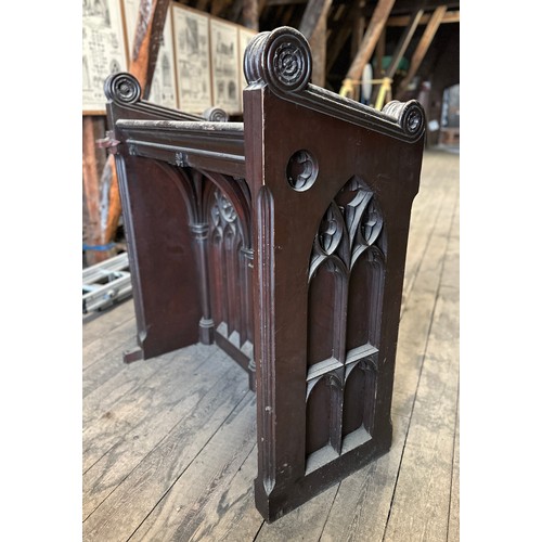 165 - The vicar’s stall ex Beverley Minster,  heavily carved in oak with gothic arches and Yorkshire rose,... 