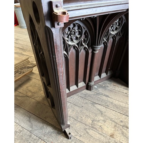 165 - The vicar’s stall ex Beverley Minster,  heavily carved in oak with gothic arches and Yorkshire rose,... 