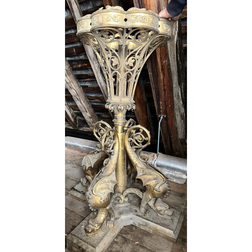 176 - Two very good quality 19thC ornate brass gas light fittings, the base surrounded by four sea wyverns... 