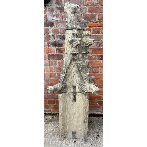 200 - A two piece Tadcaster stone pinnacle dating from the 1300’s with three grotesques and leadwork fixin... 