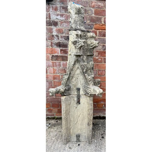 200 - A two piece Tadcaster stone pinnacle dating from the 1300’s with three grotesques and leadwork fixin... 