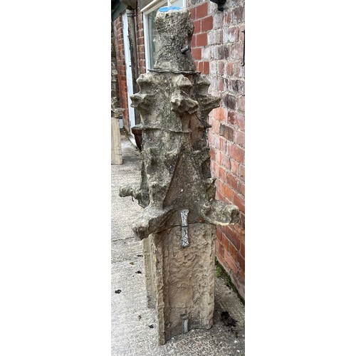 200 - A two piece Tadcaster stone pinnacle dating from the 1300’s with three grotesques and leadwork fixin... 