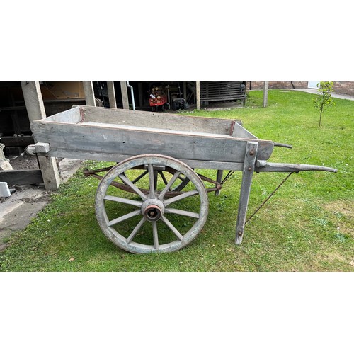 182 - A 19thC hand cart with wooden wheels and steel rims and suspension. Originally used to transport sca... 