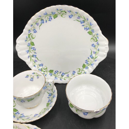 3 - A part tea set by Richmond decorated in blue flowers to include 5x tea cups, 6x saucers, 5x side pla... 