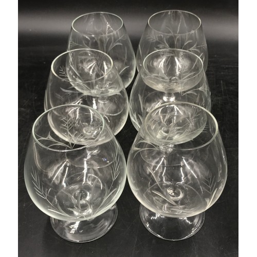 49 - A collection of glasses to include 6x brandy glasses with etched design, 5x sherry glasses with etch... 