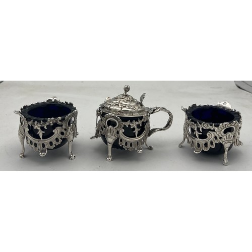 60 - A pair of silver salts and a mustard pot Birmingham 1838/39, maker Joseph Wilmore. All with blue gla... 