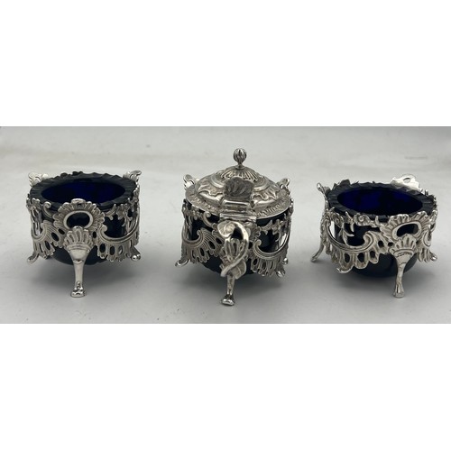 60 - A pair of silver salts and a mustard pot Birmingham 1838/39, maker Joseph Wilmore. All with blue gla... 