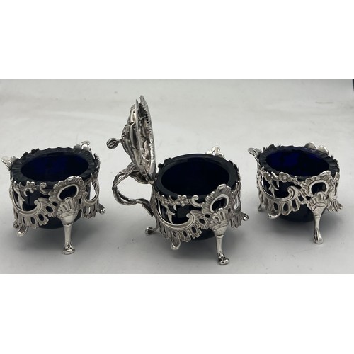 60 - A pair of silver salts and a mustard pot Birmingham 1838/39, maker Joseph Wilmore. All with blue gla... 