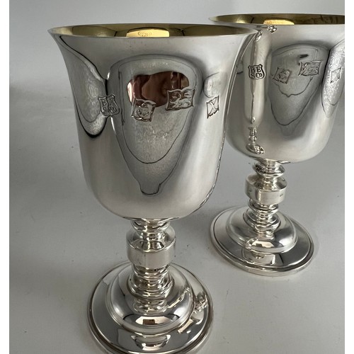 68 - A boxed pair of Barker Ellis silver goblets Birmingham 1973, numbers 254 and 255 of a limited editio... 