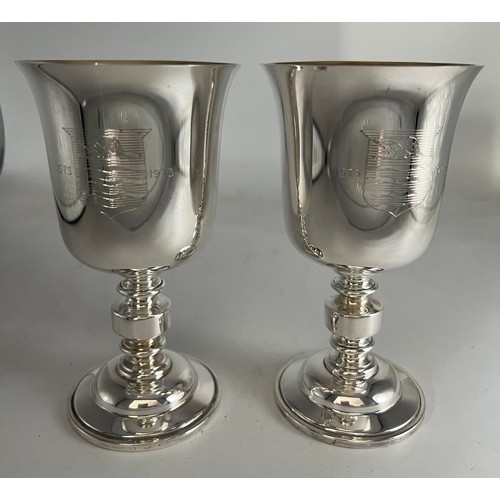 68 - A boxed pair of Barker Ellis silver goblets Birmingham 1973, numbers 254 and 255 of a limited editio... 