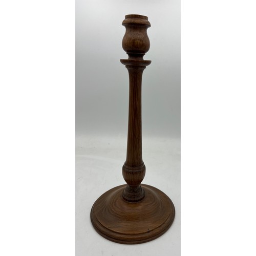 69 - A candlestick crafted from wood from St. Mary’s Church in Beverley. The donor’s father Mr Phil Thomp... 