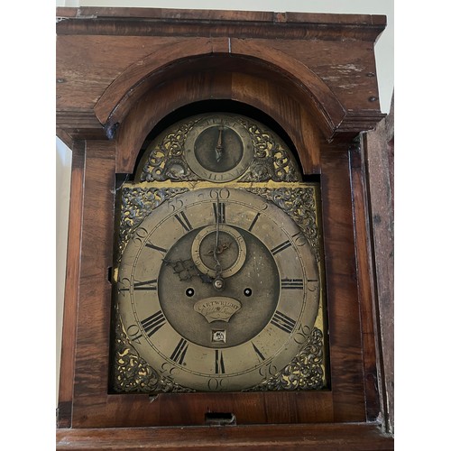 70 - A brass faced eight day walnut  longcase clock by Cartwright of Lombard Street, London. With date ap... 