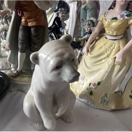 77 - A large collection of ceramics to include a Lladro Polar Bear, Japanese ceramics, The Leonardo Colle... 