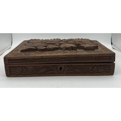 85 - A vintage carved wooden Indian box 30cm x 20cm x 6cm h.