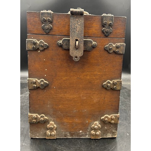 87 - A 19thC metal bound oak box to house bottles or decanters ex St Mary’s Church. 36cm h x 26 cm w x 14... 