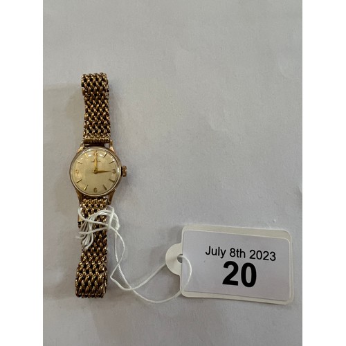 20 - An Omega 9ct ladies watch with marked case and strap. Total weight 30gms.