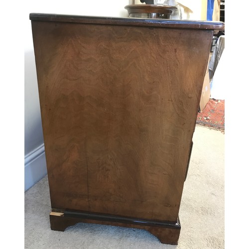 3 - A 20thC burr walnut kneehole desk of small proportions 78w x 49d x 74cm h.