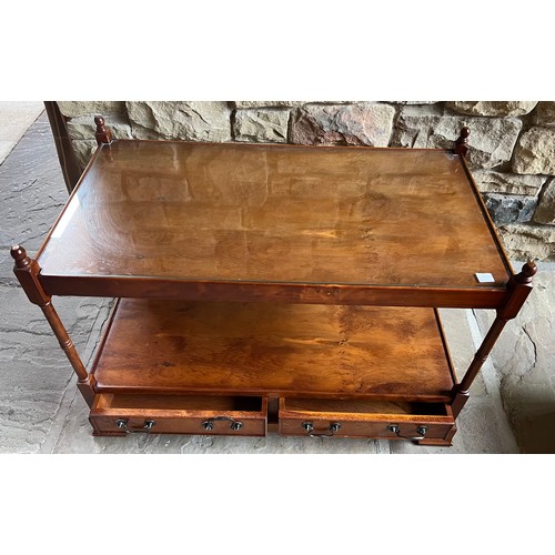 11 - A 20thC two height yew wood coffee table with 2 drawers to base with glass top 57h x 86w x 46cm.