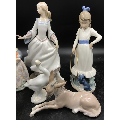 A collection of Lladro and Nao figures comprising, Lladro 'Gone