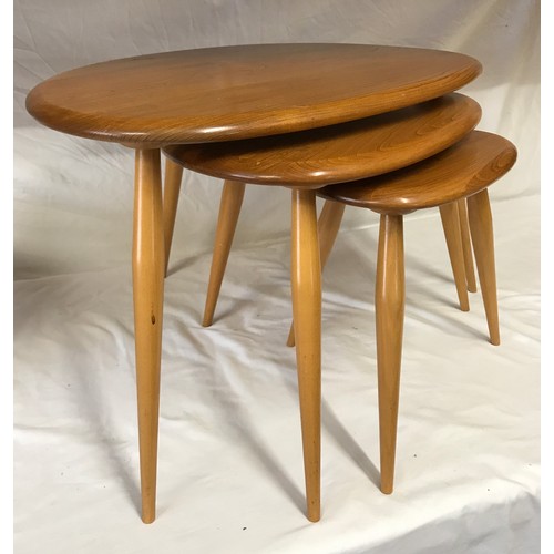 31 - An Ercol Golden Dawn nest of three Pebble side tables largest 40.5h x 65w x 45cm d.