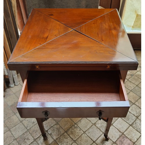 37 - An Edwardian mahogany envelope card table with drawer to front and green baize and four recessed hol... 