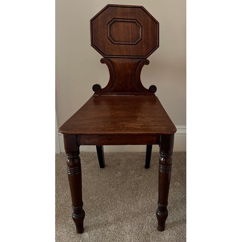 42 - A 19thC mahogany hall chair, 82cm h