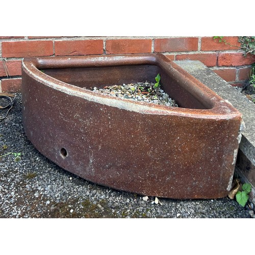 1350 - Two 19thC treacle glazed corner feeding troughs. 60cm x 60 x 58.