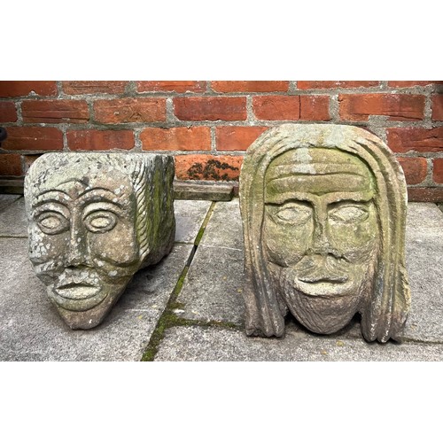 1351 - A pair of well carved stone heads.