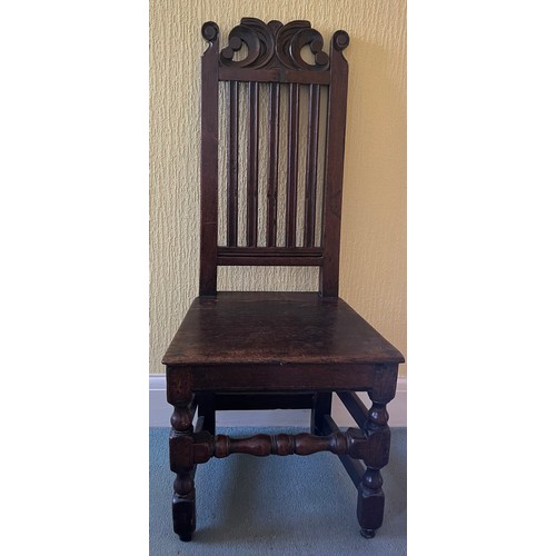 50 - An early oak side chair C1700.