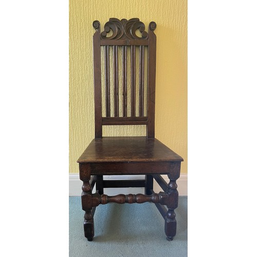 50 - An early oak side chair C1700.