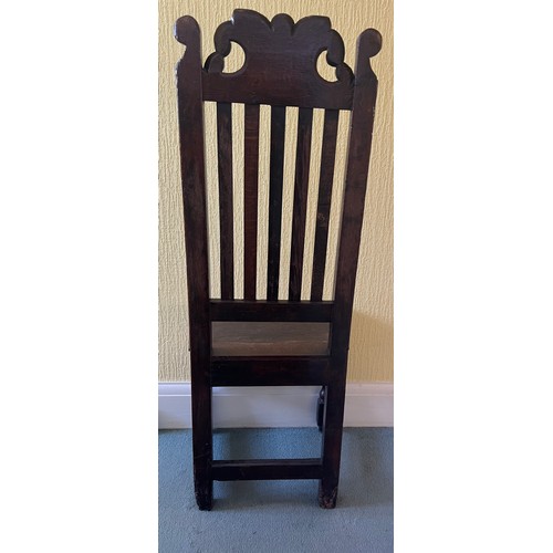 50 - An early oak side chair C1700.