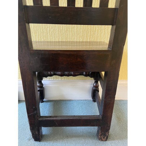 50 - An early oak side chair C1700.