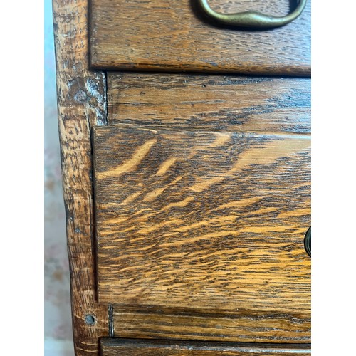 52 - A 19thC oak five height chest of drawers with bracket feet. 78.5cm w x 48.5d x 98h.